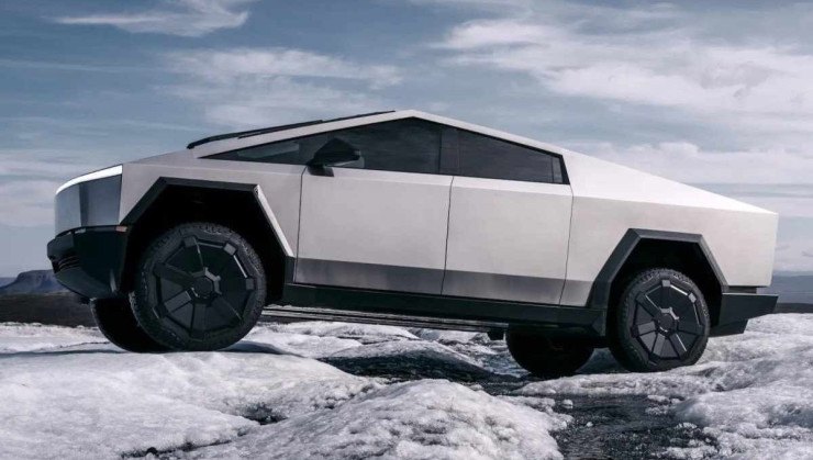 Tesla Cybertruck visto de lado trafegando sobre geleiras. 