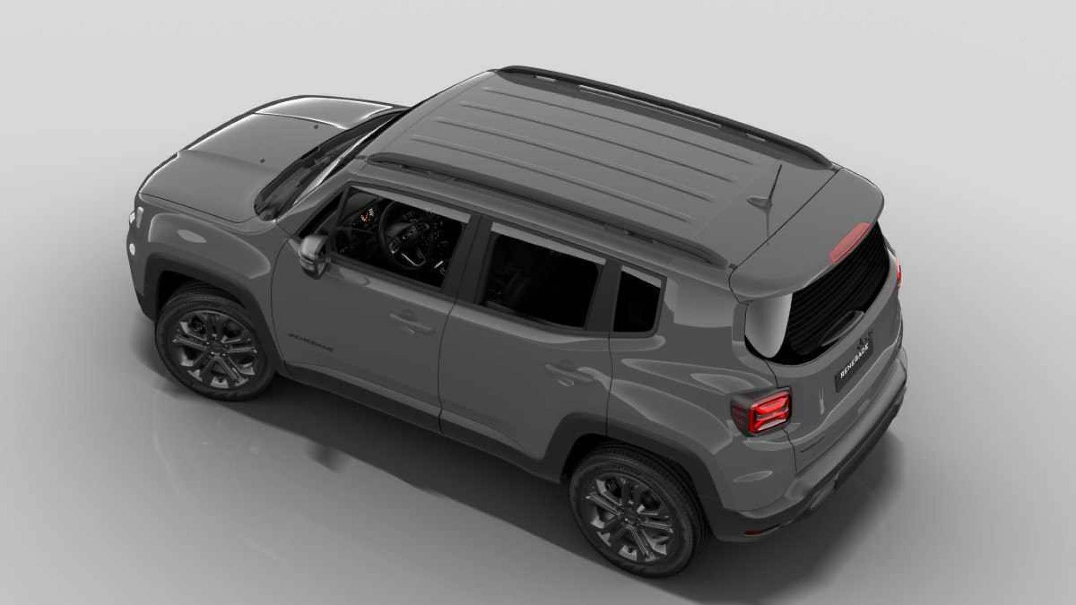 Jeep Renegade Night Eagle modelo 2025 cinza de traseira estático no estúdio