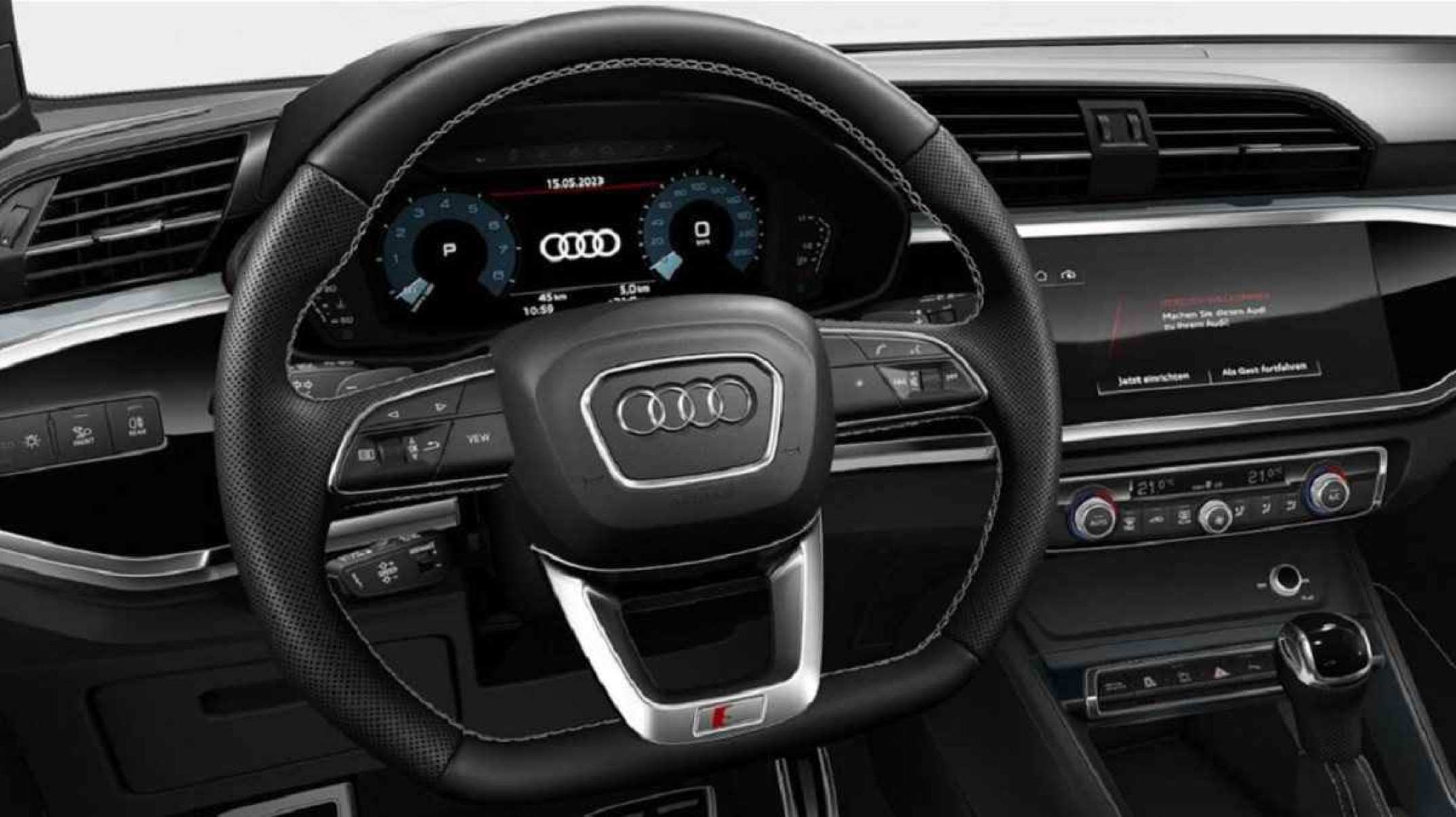 Interior com painel de volante de Audi Q3 em fundo branco no estúdio
