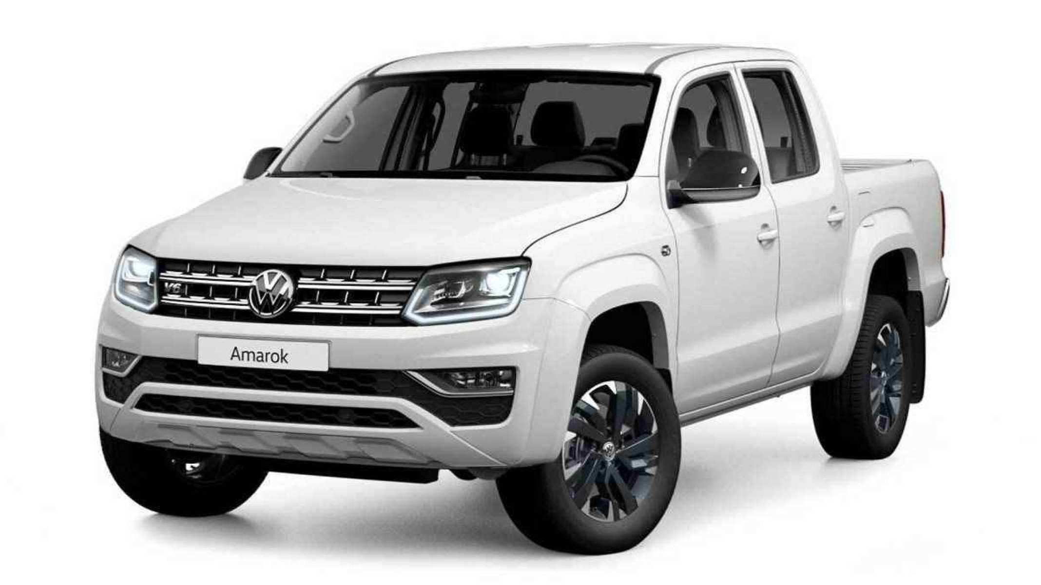 Volkswagen Amarok V6 branca de frente estática no estúdio 