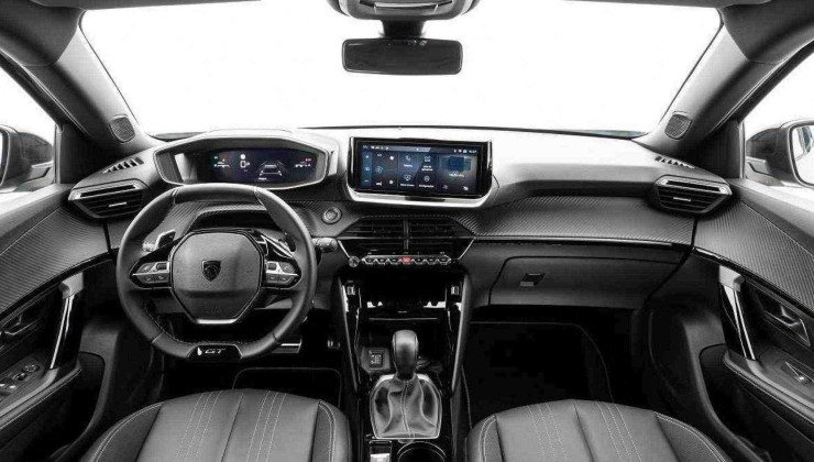 Peugeot 2008 GT modelo 2025 cinza e teto preto interior com painel volante e bancos dianteiros