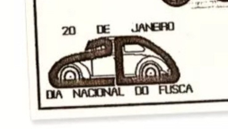 Anúncio de 1989 sobre o dia nacional do Fusca com detalhe da logo estilizada no canto inferior esquerdo