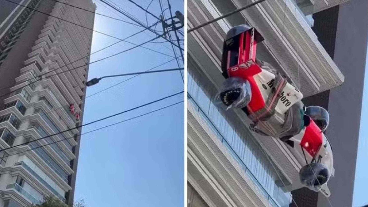 Réplica de McLaren de Senna é içada para dentro de apartamento